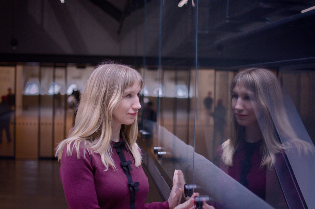 Candid portrait of Kate Julia at a gallery